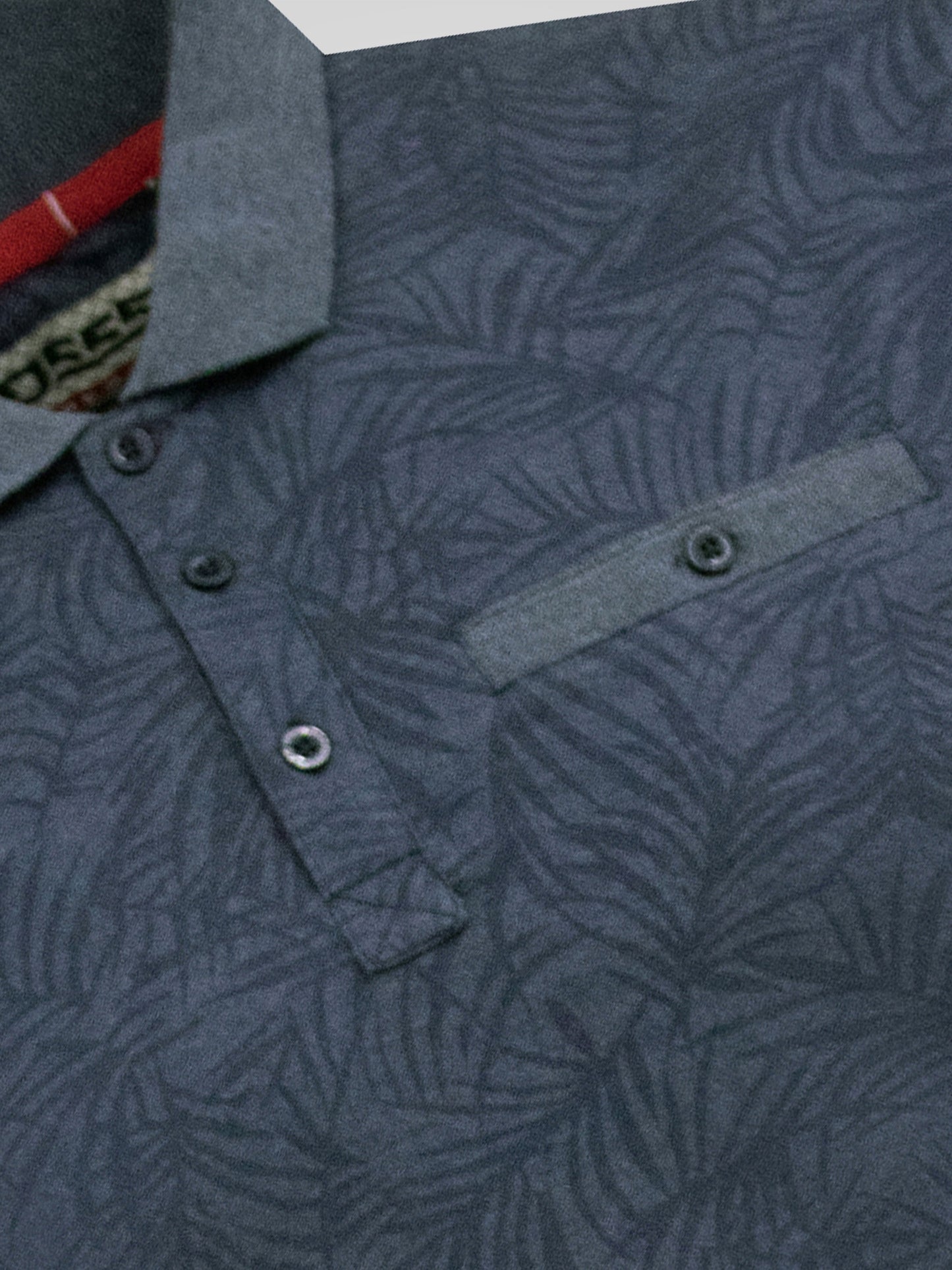 UTTOXETER -D555 Denim Blue All Over Leaf Print Short Sleeve Polo